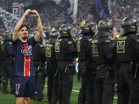 PSG's Vitinha celebrates after the Champions League final soccer match between Paris Saint-Germain and Inter Milan at the Allianz Arena in Munich, Germany, Saturday, May 31, 2025. (AP Photo/Alexandra Beier)

- XCHAMPIONSLEAGUEX
