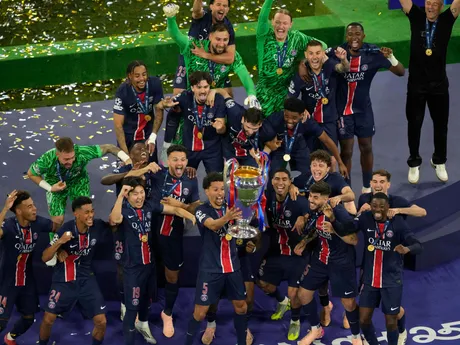 PSG players celebrate with the trophy after winning the Champions League final soccer match between Paris Saint-Germain and Inter Milan at the Allianz Arena in Munich, Germany, Saturday, May 31, 2025. (AP Photo/Michael Probst)

- XCHAMPIONSLEAGUEX