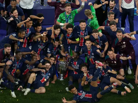 Players of PSG pose with the trophy after winning the Champions League tournament at the Allianz Arena in Munich, Germany, Saturday, May 31, 2025. (AP Photo/Michael Probst)

- XCHAMPIONSLEAGUEX