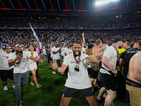 PSG fans invade the field at the end of the Champions League final soccer match between Paris Saint-Germain and Inter Milan at the Allianz Arena in Munich, Germany, Saturday, May 31, 2025. (AP Photo/Martin Meissner)

- XCHAMPIONSLEAGUEX